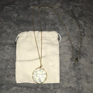 Long chain white and blue charm necklace